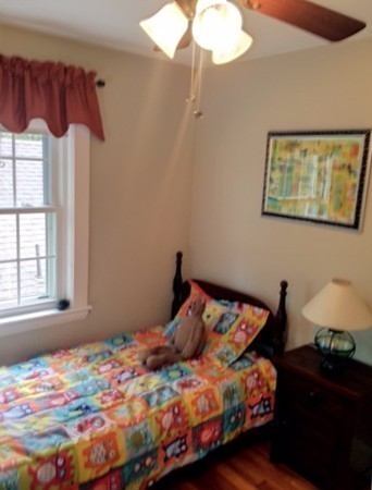 62 Edgehill Road Winthrop, MA 02152 - Photo 15 of 29 a bedroom with a bed and a window