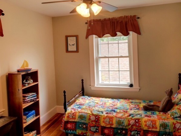 62 Edgehill Road Winthrop, MA 02152 - Photo 16 of 29 a bedroom with bed and a window
