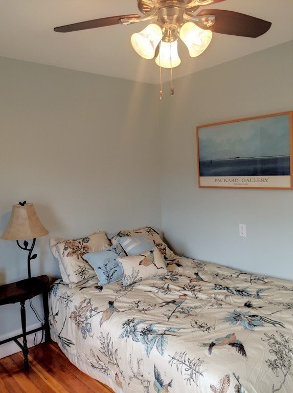 62 Edgehill Road Winthrop, MA 02152 - Photo 17 of 29 a bed sitting in a bedroom next to a window