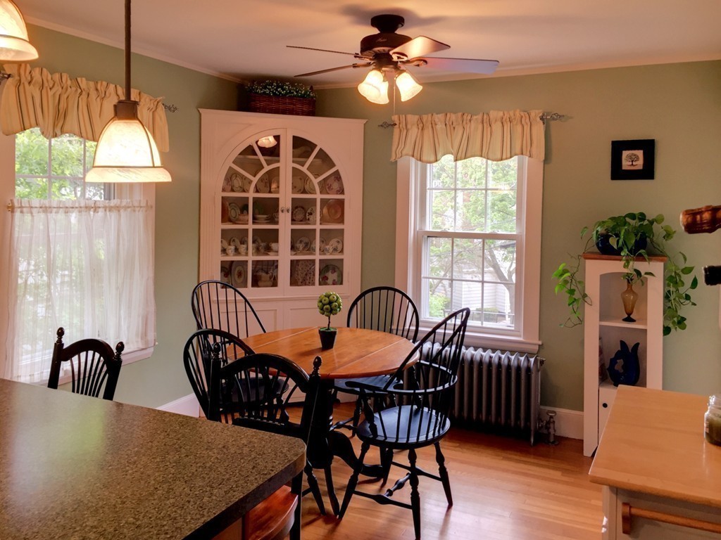 62 Edgehill Road Winthrop, MA 02152 - Photo 7 of 29 a view of a dining room with furniture window and wooden floor