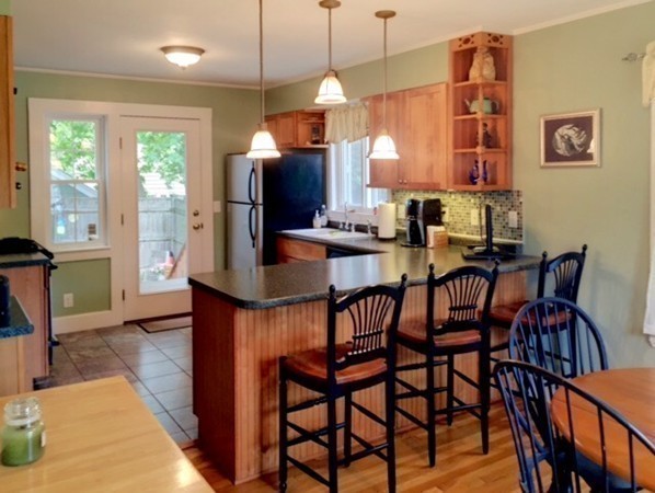 62 Edgehill Road Winthrop, MA 02152 - Photo 8 of 29 a dining room with furniture and window