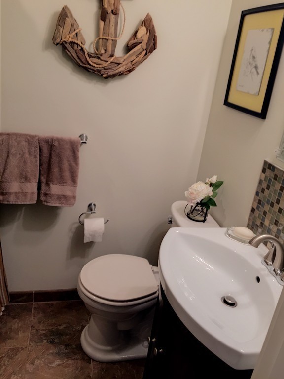 62 Edgehill Road Winthrop, MA 02152 - Photo 10 of 29 a bathroom with a sink and a toilet