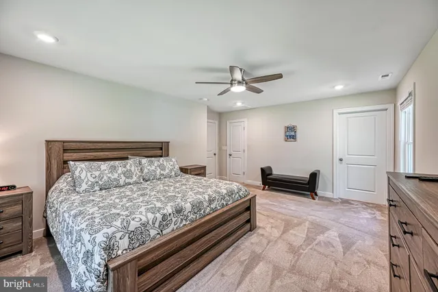 an aerial view of a house with outdoor space