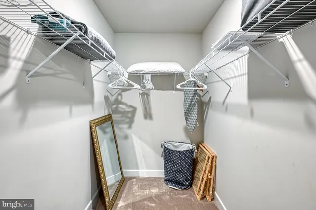 an aerial view of residential house with outdoor space and swimming pool