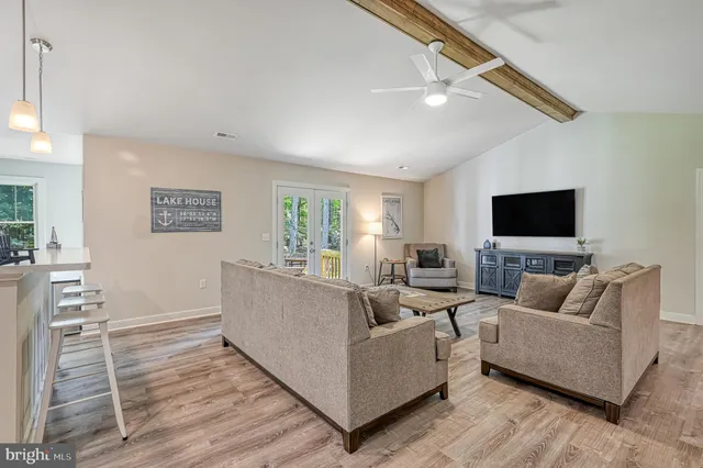 a view of a park with plants and a lake view