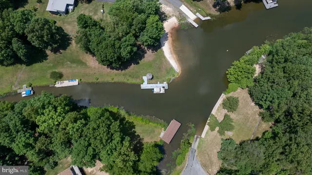 a backyard of a house with a lake view