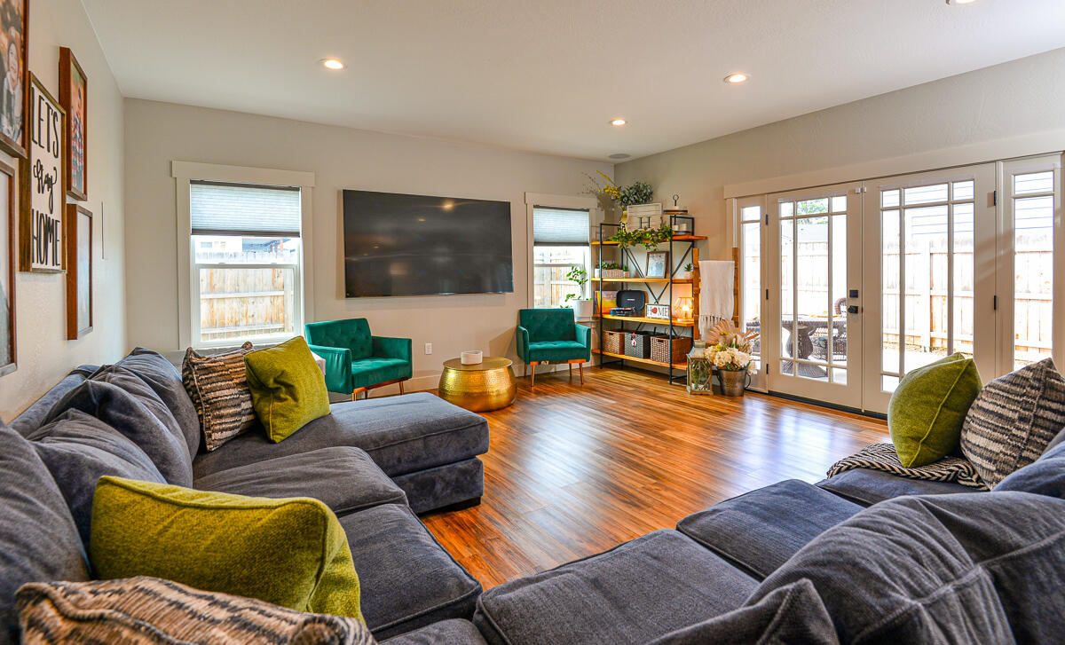 1029 Brandon Way Phoenix, OR 97535 - Photo 1 of 75 a living room with furniture and a flat screen tv