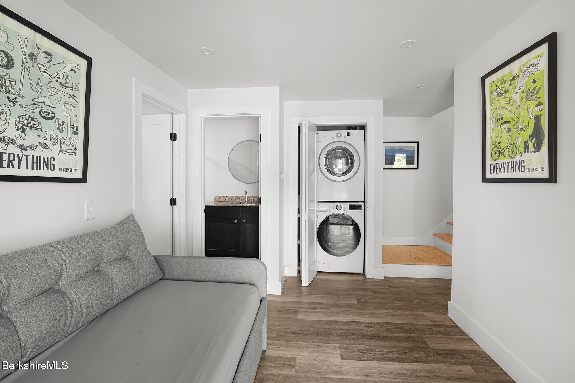 140 Beaver Dam Road Lee, MA 01238 - Photo 15 of 29 a living room with furniture and a washer dryer