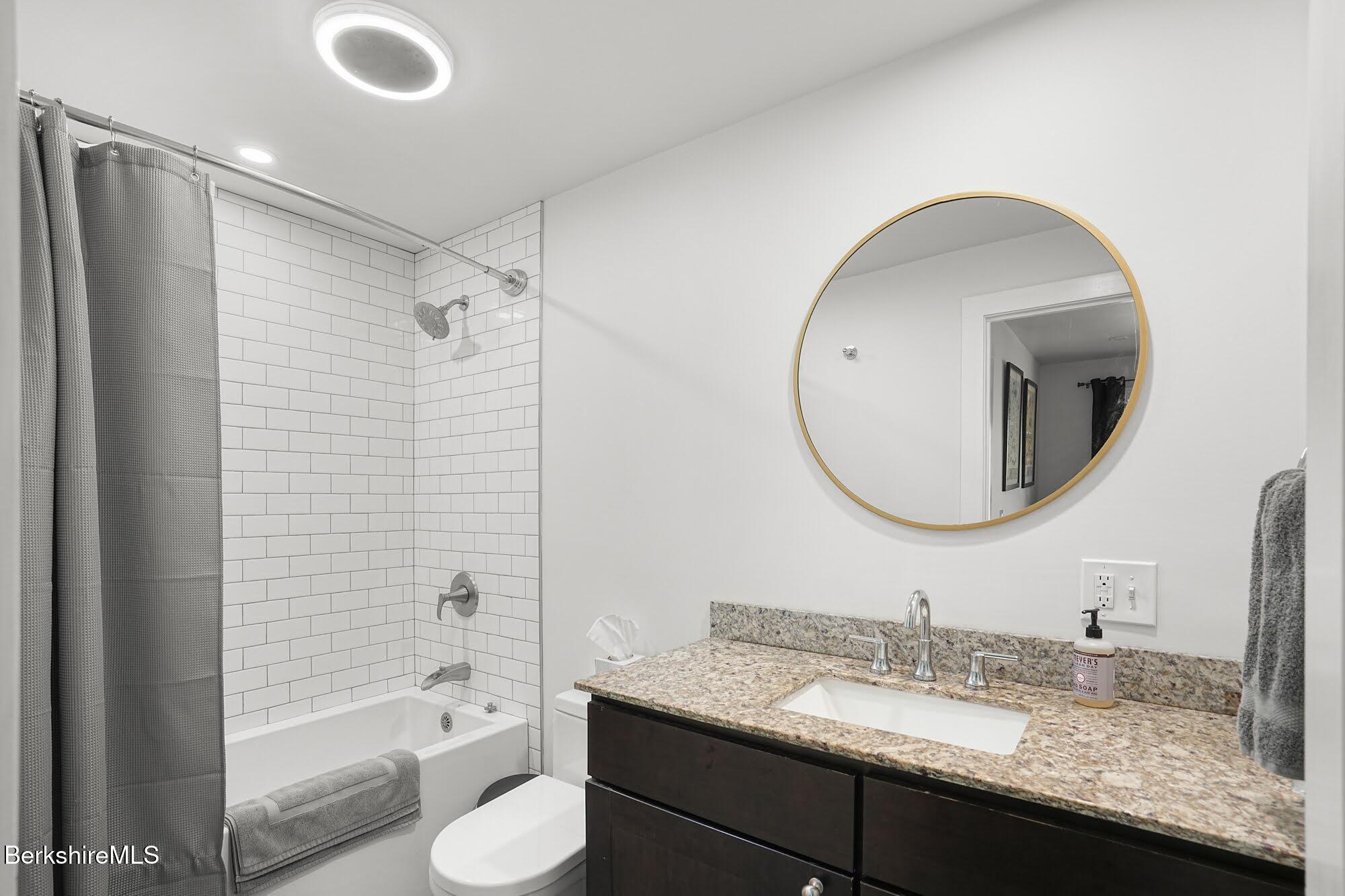 140 Beaver Dam Road Lee, MA 01238 - Photo 19 of 29 a bathroom with a granite countertop sink toilet and shower