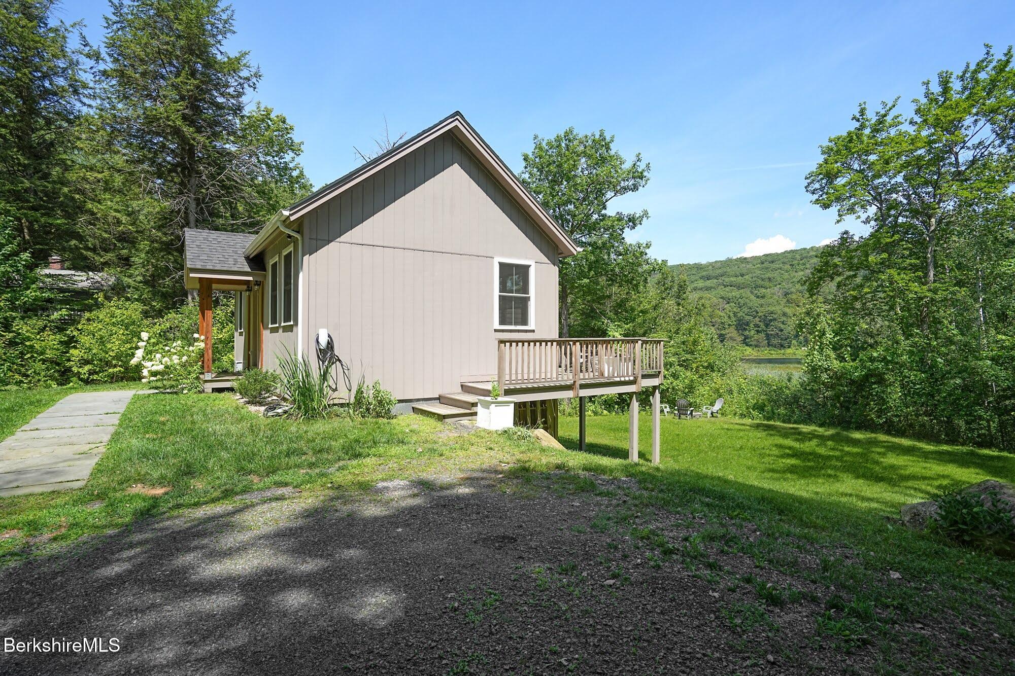 140 Beaver Dam Road Lee, MA 01238 - Photo 27 of 29 a view of a house with a yard