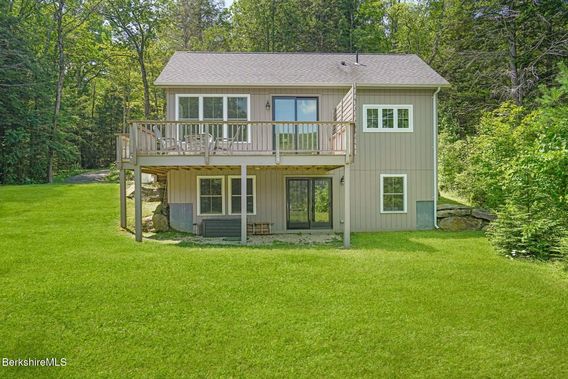 140 Beaver Dam Road Lee, MA 01238 - Photo 28 of 29 a front view of a house with a garden