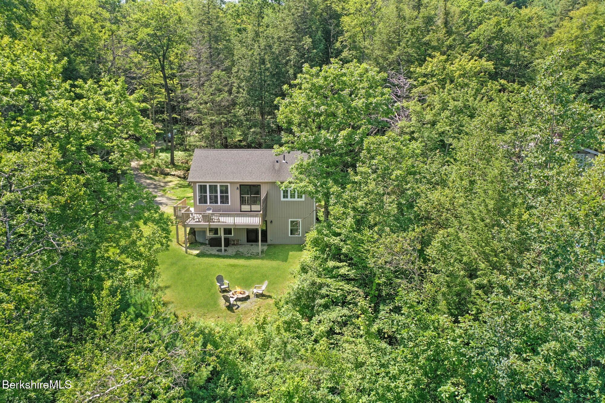140 Beaver Dam Road Lee, MA 01238 - Photo 4 of 29 a view of a house with a yard