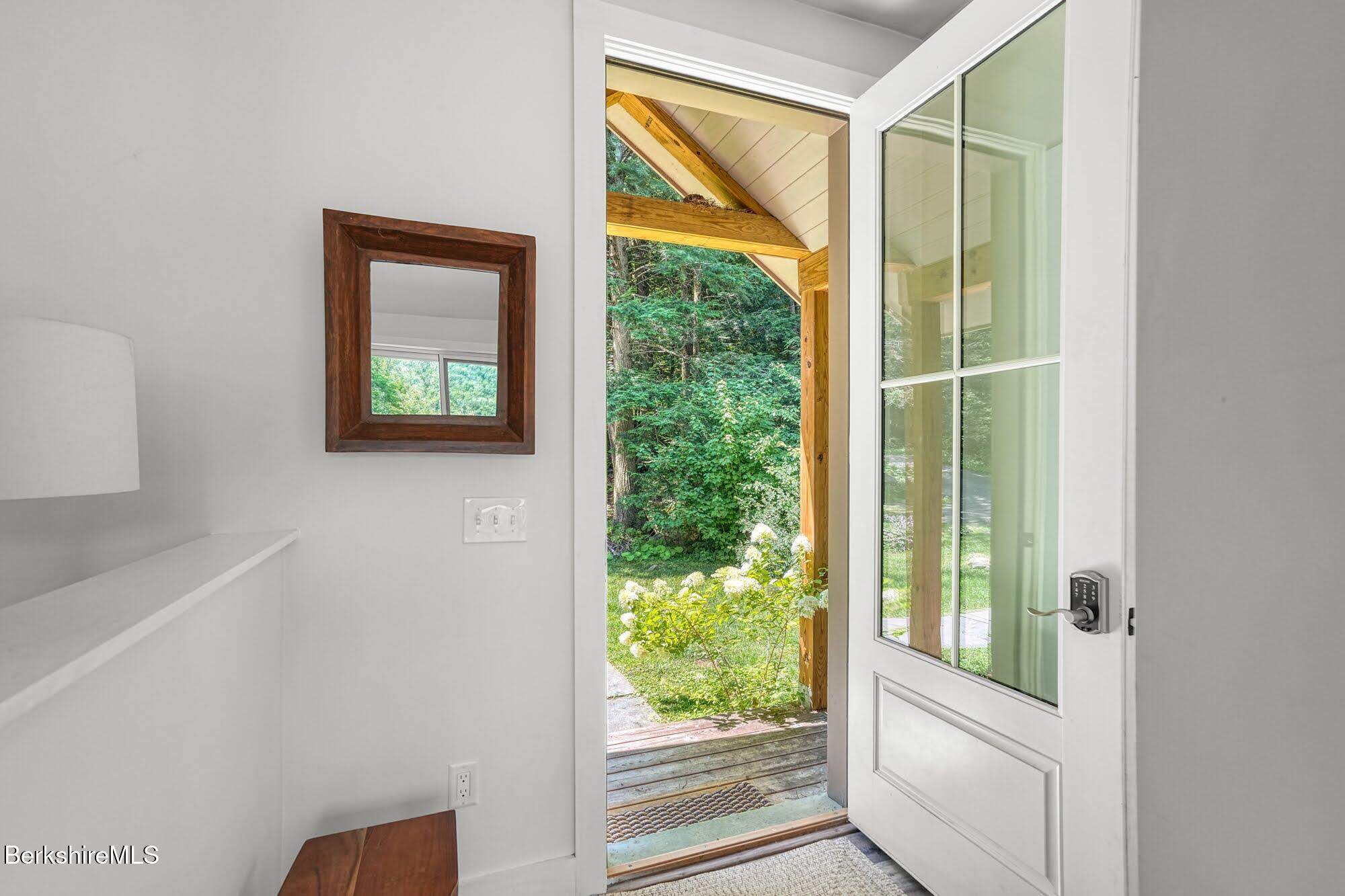 140 Beaver Dam Road Lee, MA 01238 - Photo 5 of 29 a view of a door and a window