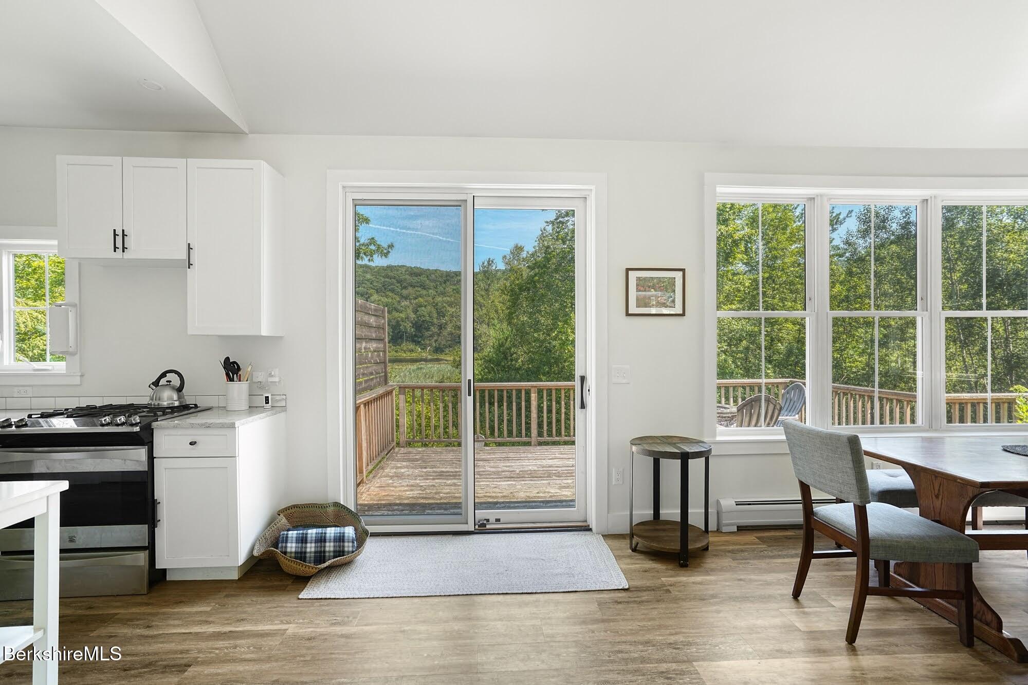 140 Beaver Dam Road Lee, MA 01238 - Photo 6 of 29 a view of a dining room with furniture window and wooden floor