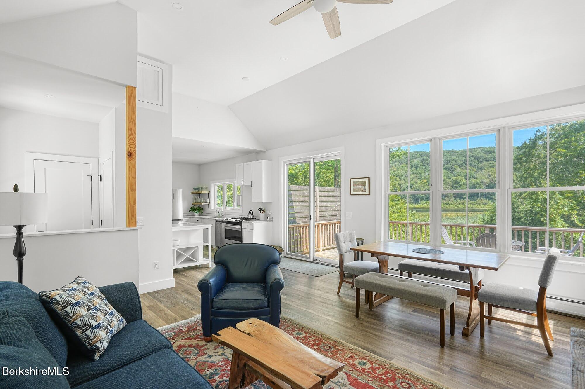 140 Beaver Dam Road Lee, MA 01238 - Photo 9 of 29 a living room with furniture and a large window