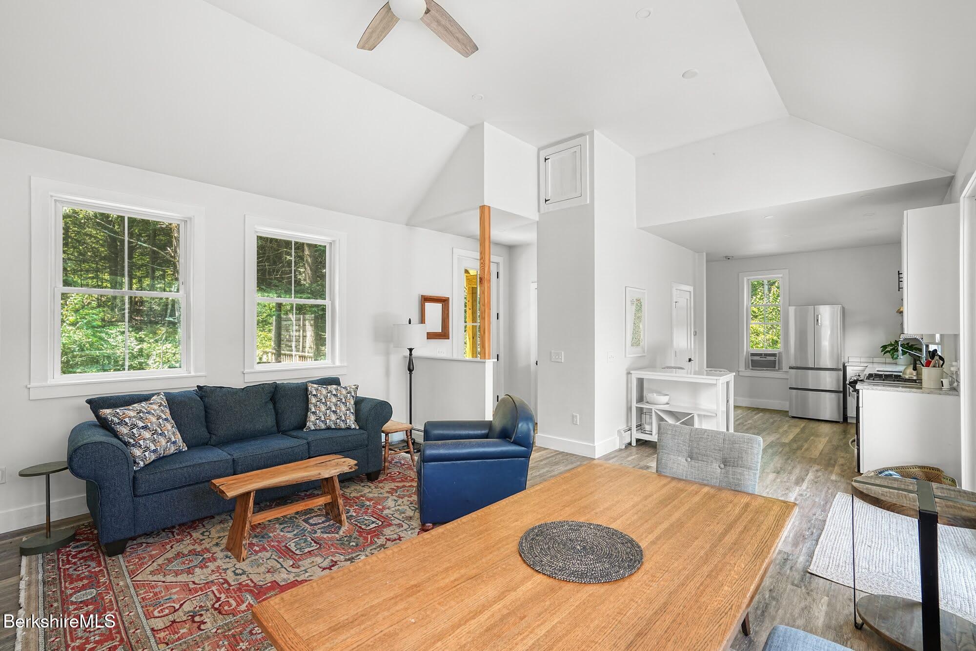 140 Beaver Dam Road Lee, MA 01238 - Photo 10 of 29 a living room with furniture and a wooden floor