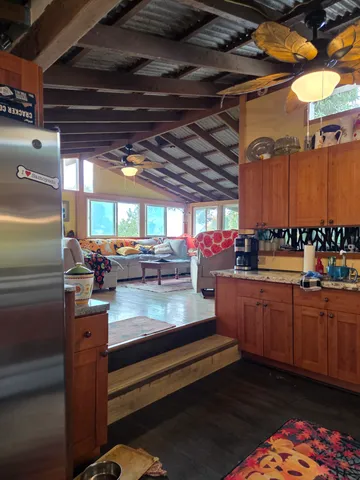 a bedroom with furniture and a window