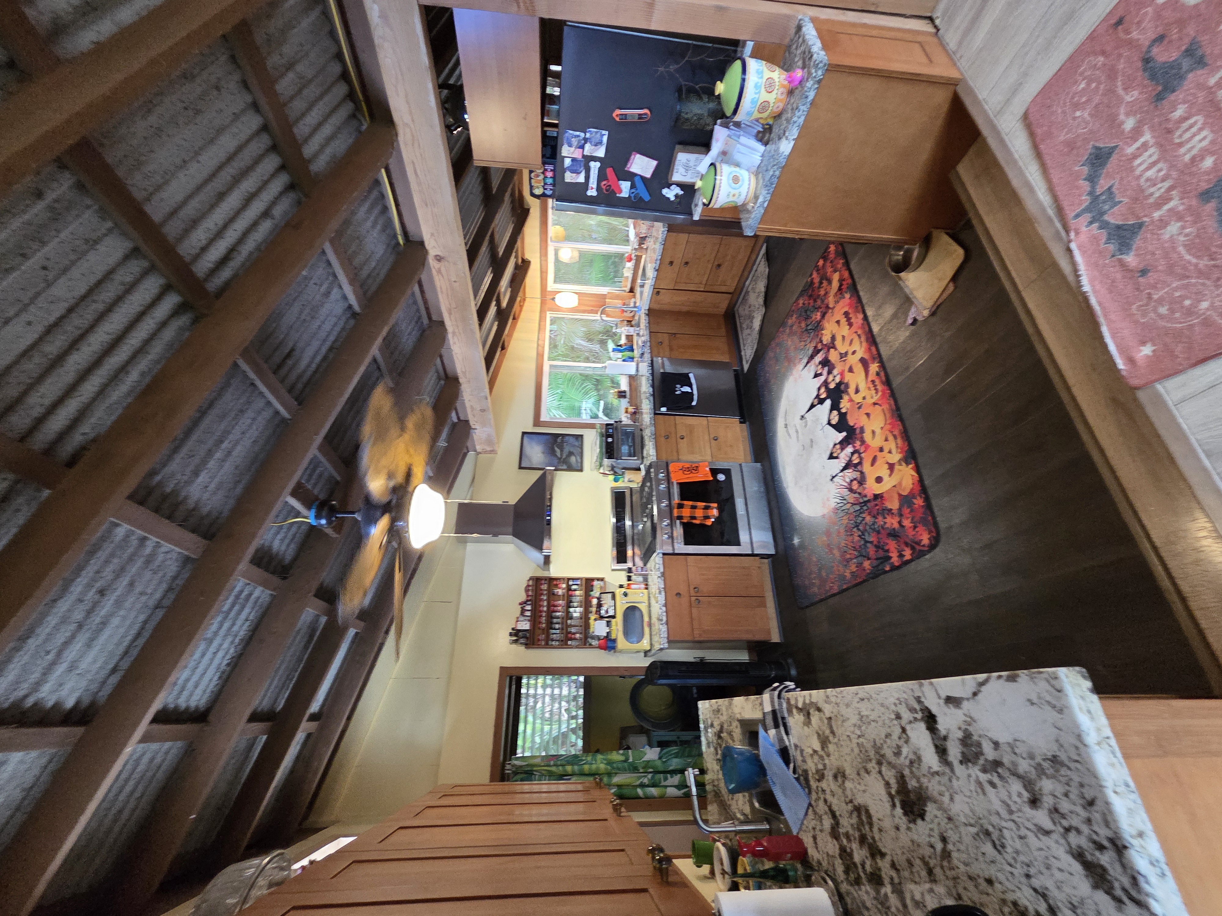 83-5782 Napoopoo Road Captain Cook, HI 96704 - Photo 15 of 30 a area with furniture and a rug