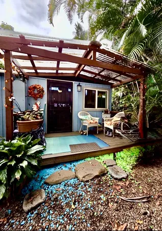 a view of a chairs and table in a patio