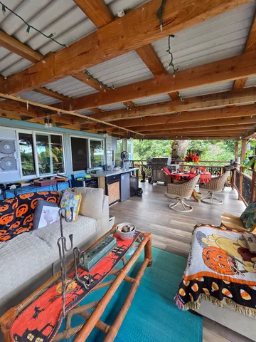 a view of parking garage with cars parked