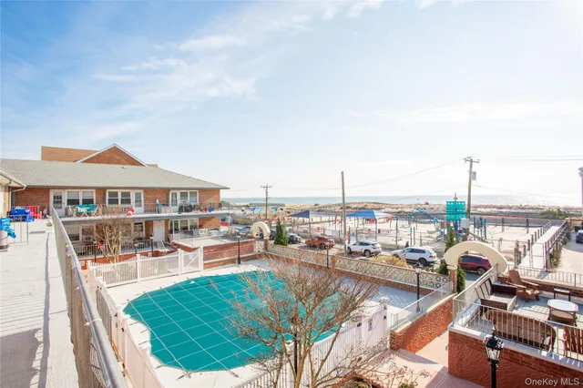 a view of balcony with furniture