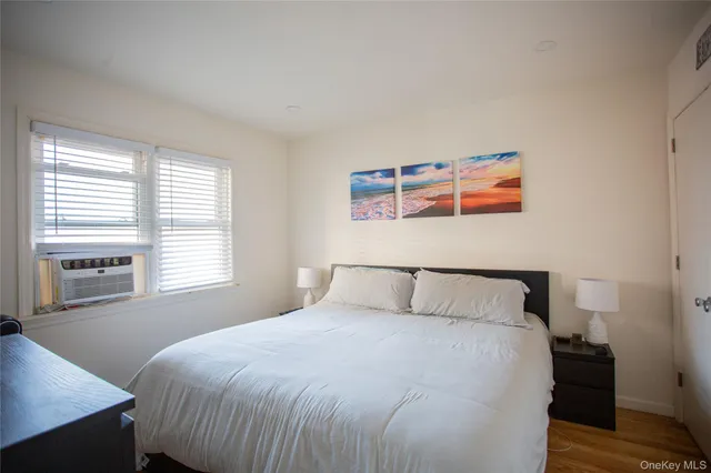 a bathroom with a sink a toilet and shower curtain