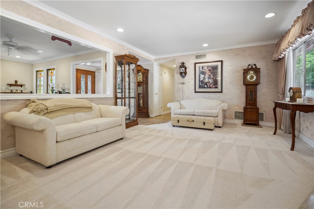 11300 Dulcet Avenue Porter Ranch, CA 91326 - Photo 13 of 55 a spacious bedroom with a large bed and a couch