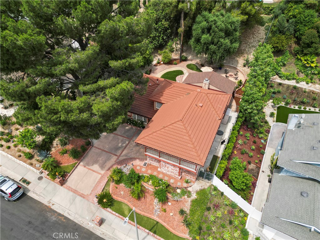 11300 Dulcet Avenue Porter Ranch, CA 91326 - Photo 5 of 55 an aerial view of a house with a garden