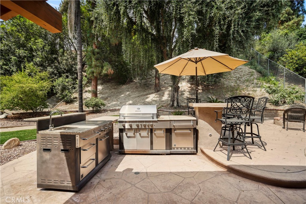 11300 Dulcet Avenue Porter Ranch, CA 91326 - Photo 54 of 55 a view of a swimming pool with chairs