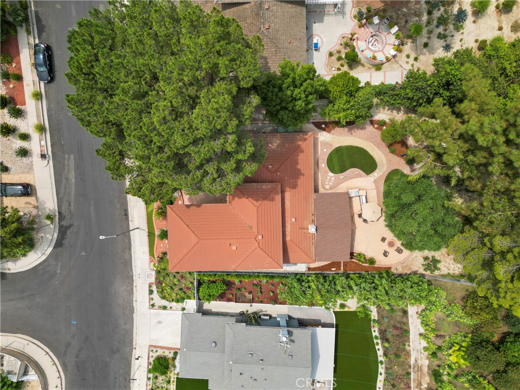 11300 Dulcet Avenue Porter Ranch, CA 91326 - Photo 6 of 55 an aerial view of a house with a garden and yard