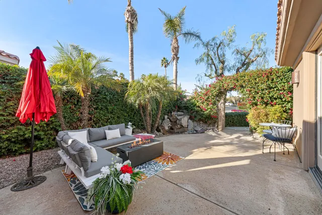 a view of yard with patio