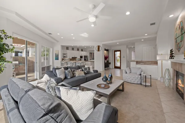 a living room with furniture and a table