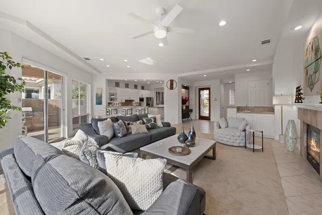 a living room with furniture and a table