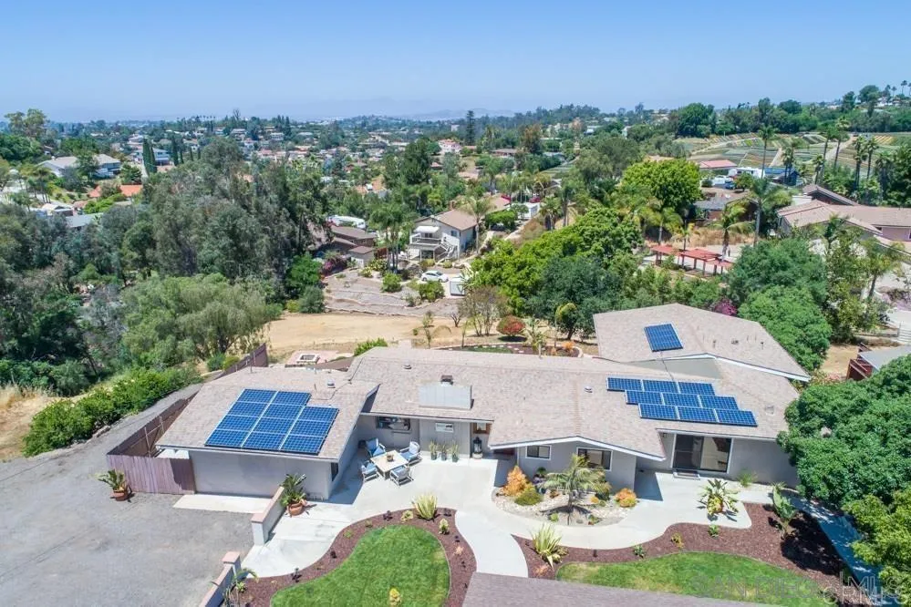 1582 Sunrise Drive Vista, CA 92084 - Photo 1 of 17 an aerial view of a house with garden space and street view