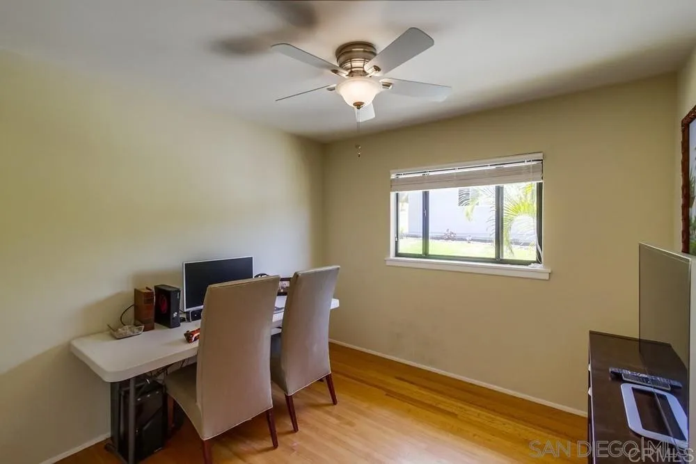 1582 Sunrise Drive Vista, CA 92084 - Photo 14 of 17 a workspace with furniture and wooden floor