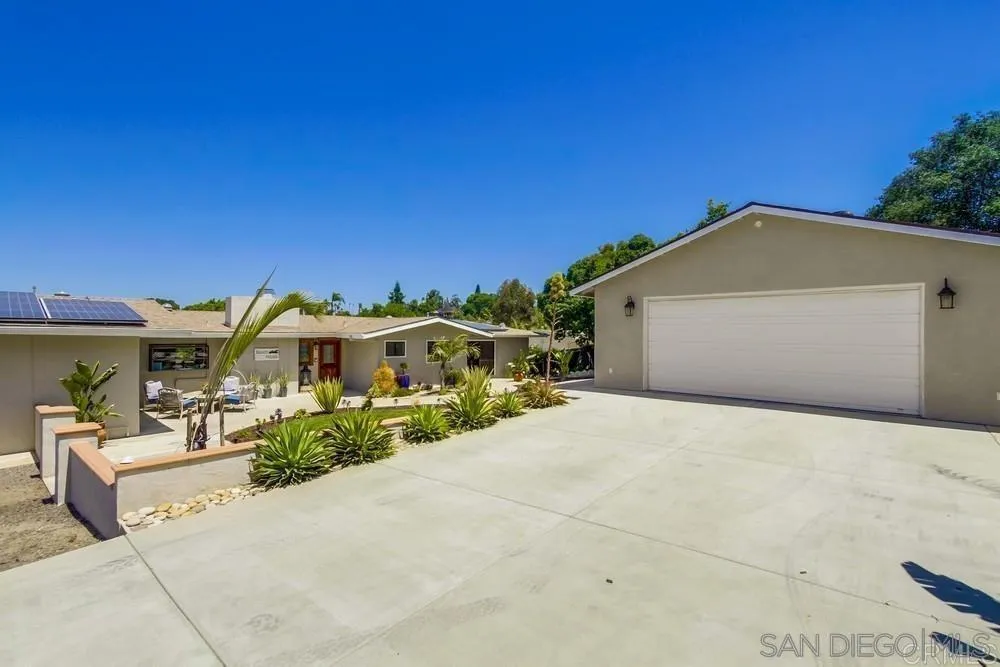 1582 Sunrise Drive Vista, CA 92084 - Photo 2 of 17 a front view of a house with a yard