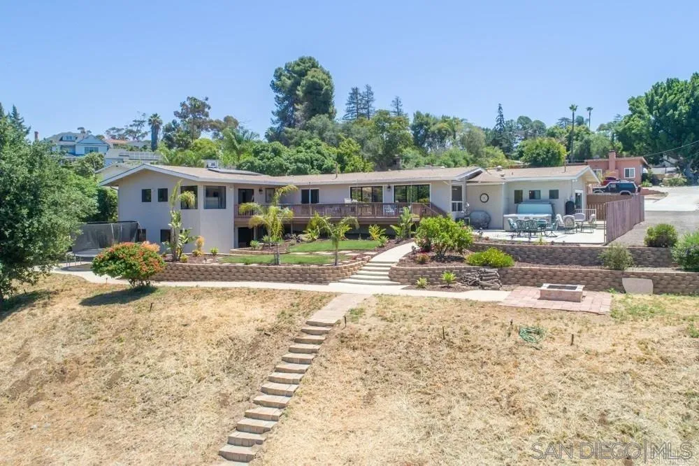 1582 Sunrise Drive Vista, CA 92084 - Photo 4 of 17 a front view of a house with garden