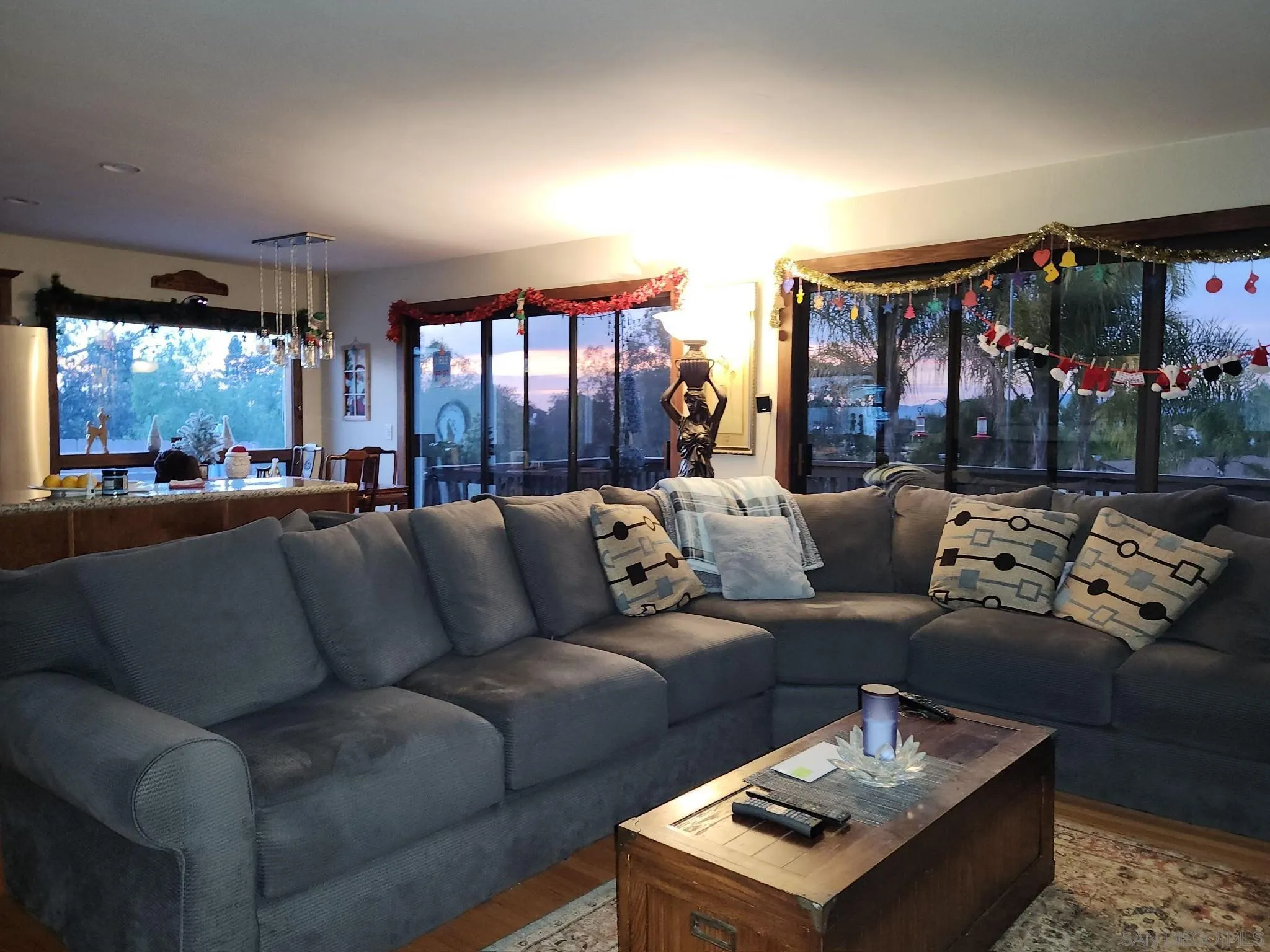 1582 Sunrise Drive Vista, CA 92084 - Photo 5 of 17 a living room with furniture and a floor to ceiling window