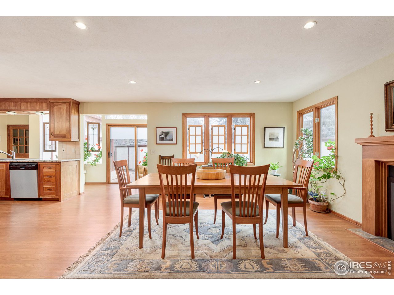 7845 Baseline Road Boulder, CO 80303 - Photo 20 of 40 a dining room with furniture and wooden floor