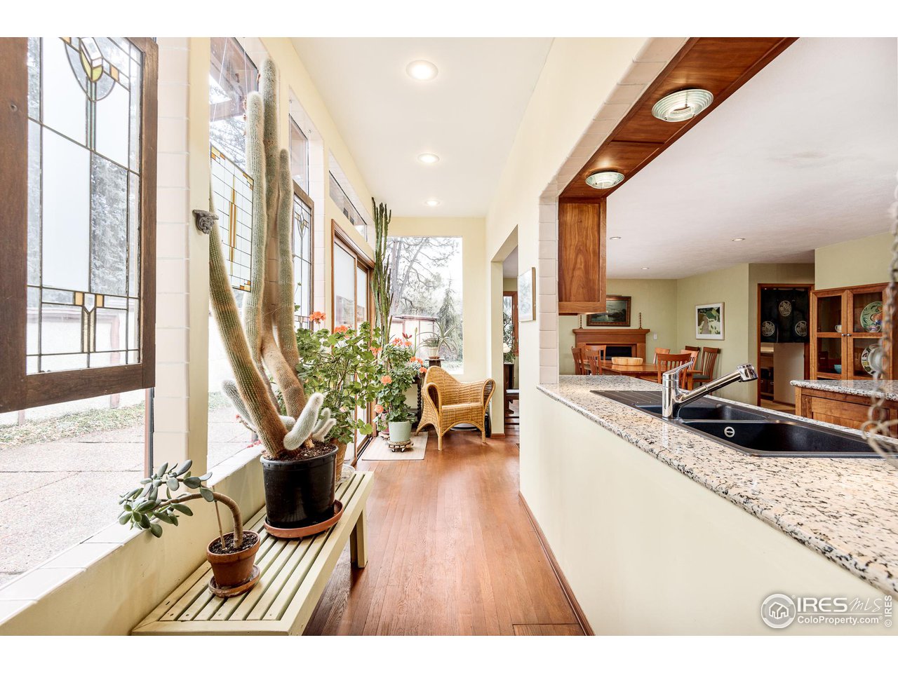7845 Baseline Road Boulder, CO 80303 - Photo 22 of 40 a living room with furniture and a large window