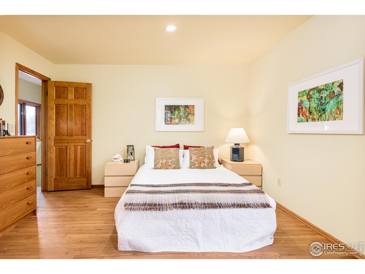7845 Baseline Road Boulder, CO 80303 - Photo 29 of 40 a large white bed in a small room