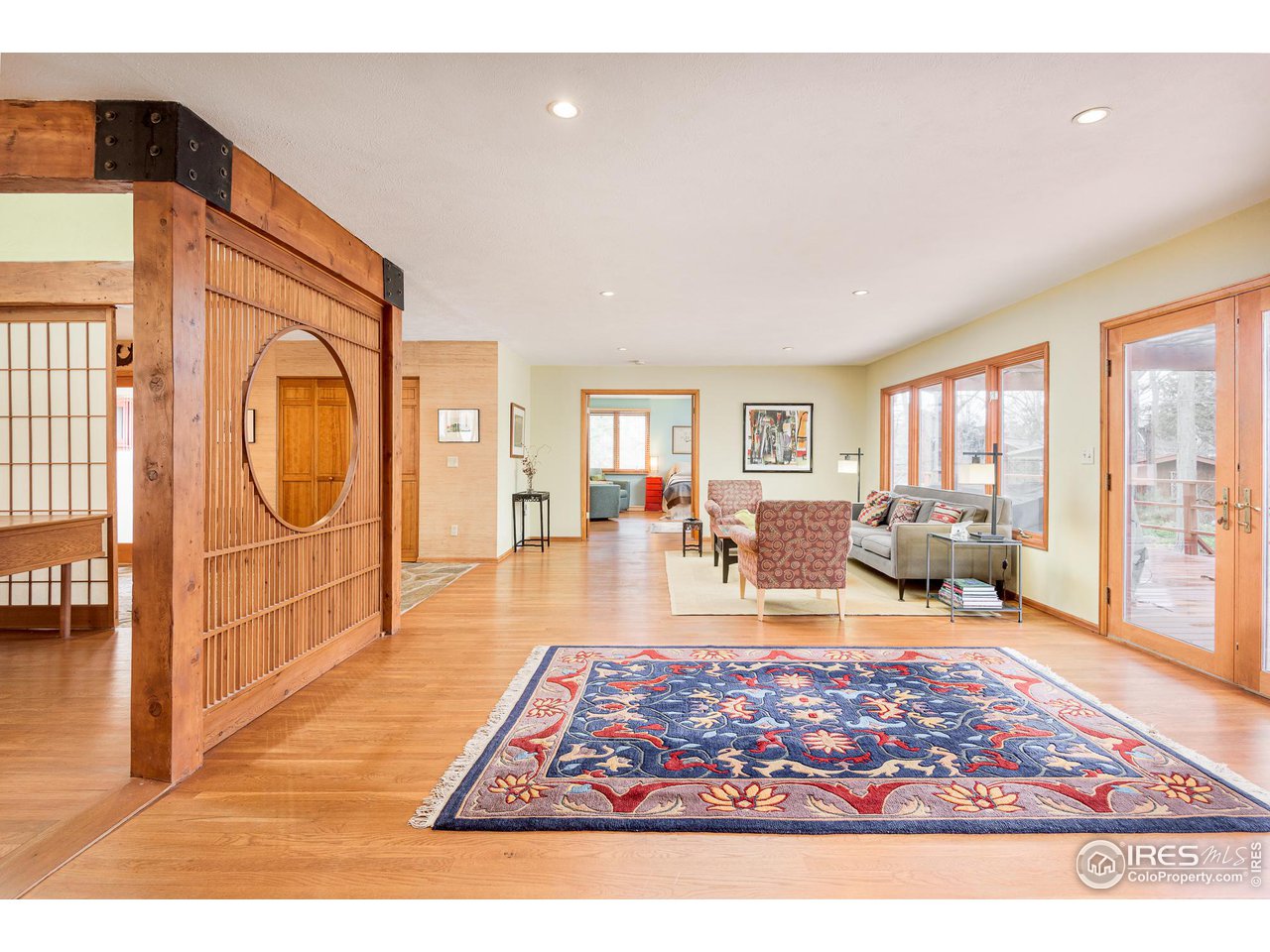 7845 Baseline Road Boulder, CO 80303 - Photo 7 of 40 a living room with furniture rug and wooden floor