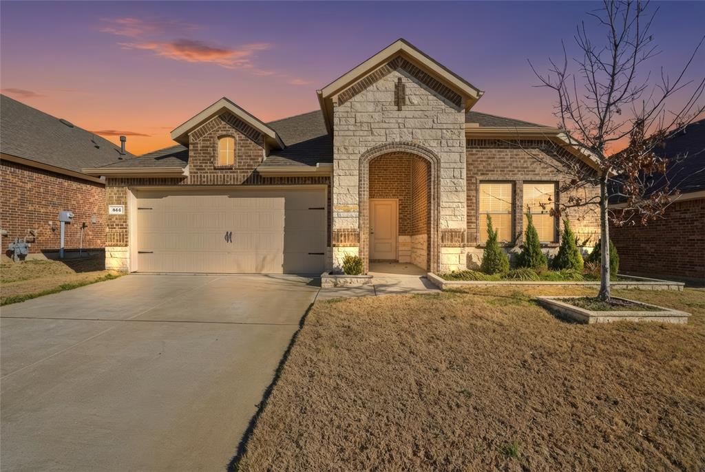 812 Indigo Road Princeton, TX 75407 - Photo 28 of 28 a front view of a house with a yard