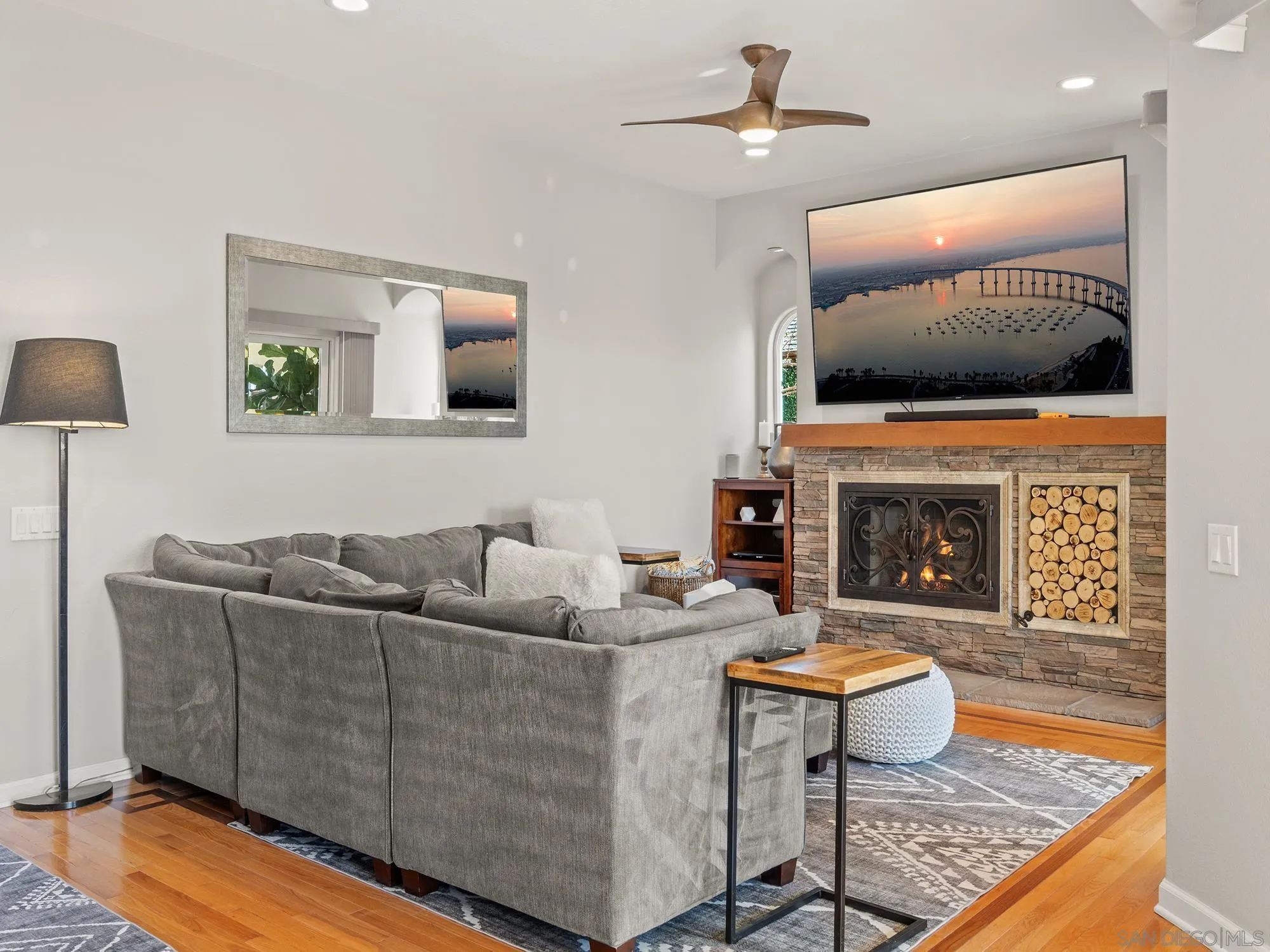 4385 Orchard Avenue San Diego, CA 92107 - Photo 14 of 55 a living room with furniture and a fireplace