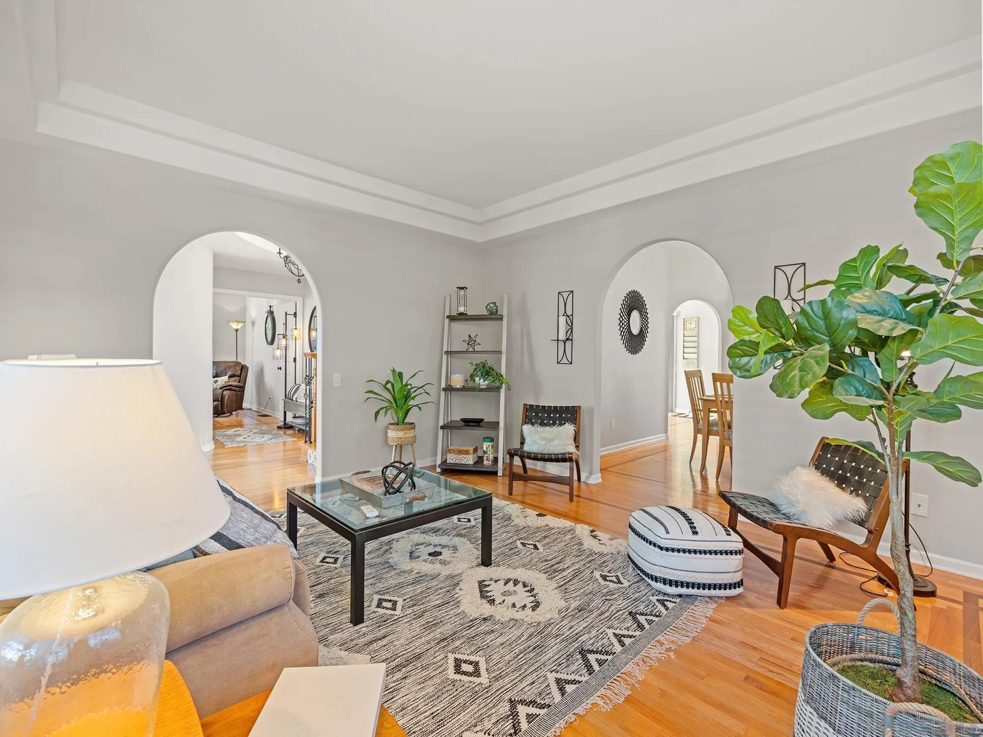 4385 Orchard Avenue San Diego, CA 92107 - Photo 17 of 55 a living room with furniture and a potted plant