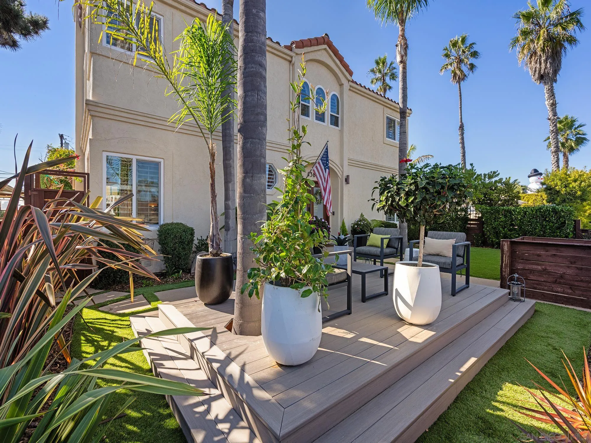 4385 Orchard Avenue San Diego, CA 92107 - Photo 44 of 55 a view of a dining table and chairs in patio