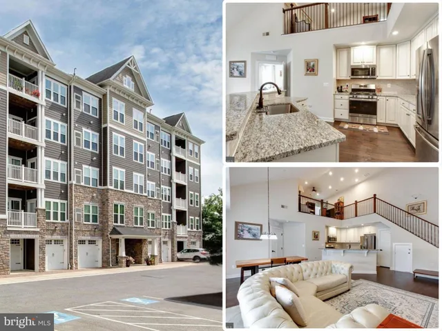a view of living room kitchen and entryway