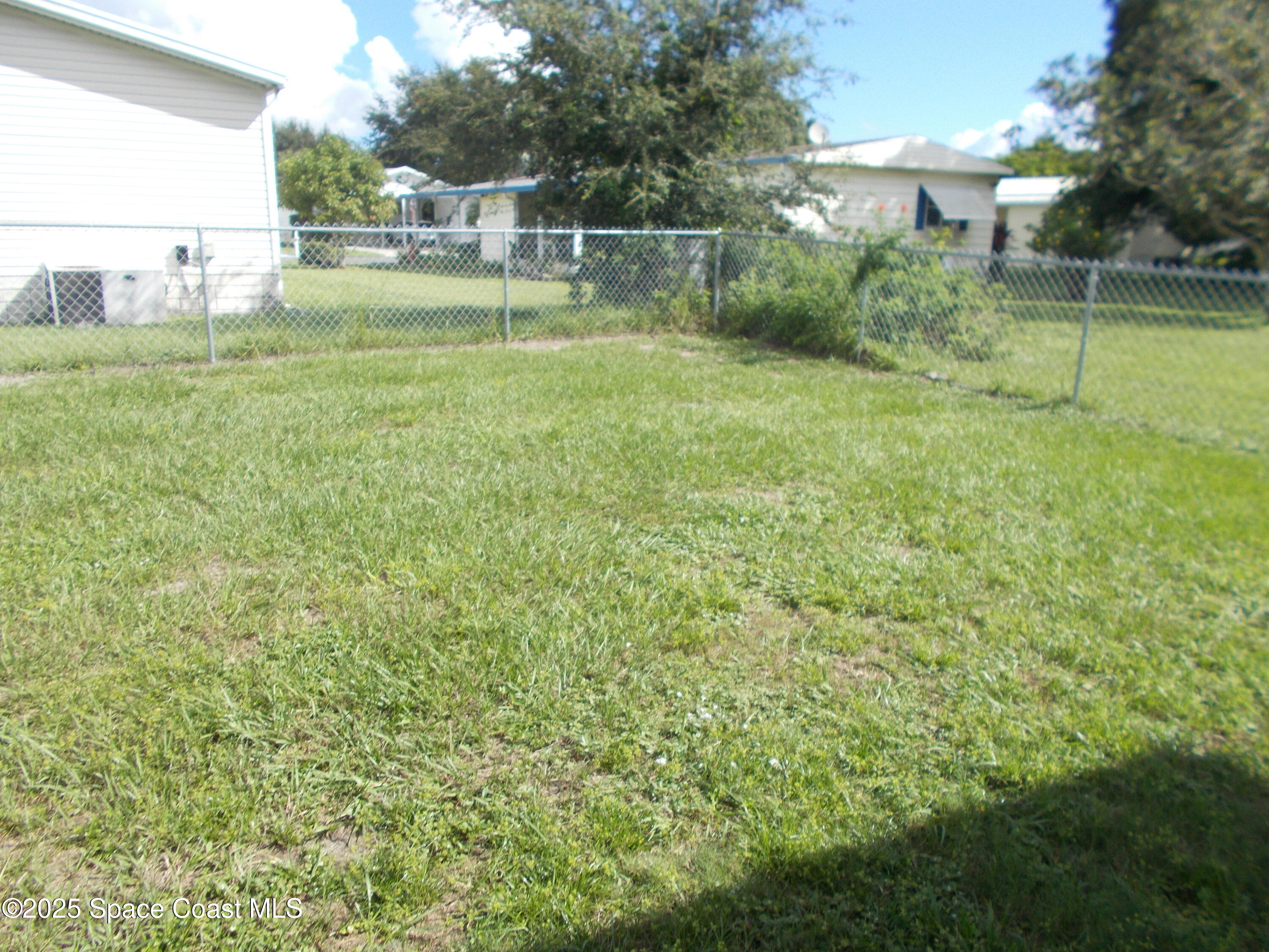 906 Spruce Street Sebastian, FL 32976 - Photo 26 of 26 a view of a green field with plants