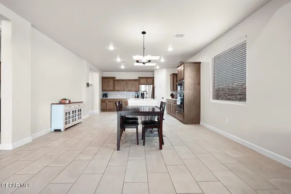 a room with a bed and cabinets