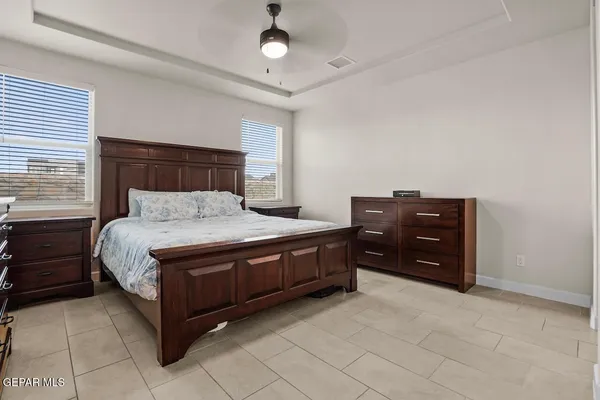 a bedroom with a bed and a dresser